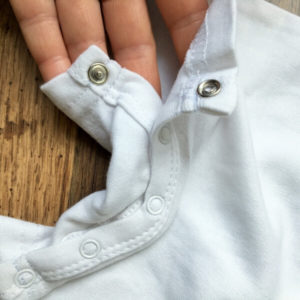 Szürke mellényes nyakkendős body