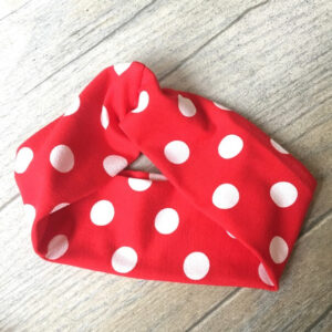 Piros pöttyös nadrág lábszárvédő fejpánt